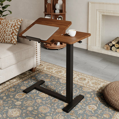 Walnut laptop desk with the desktop tilted upward