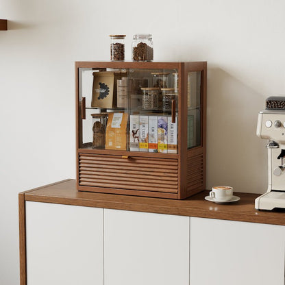 Natural wood bread cabinet with glass door and open drawer in a kitchen
