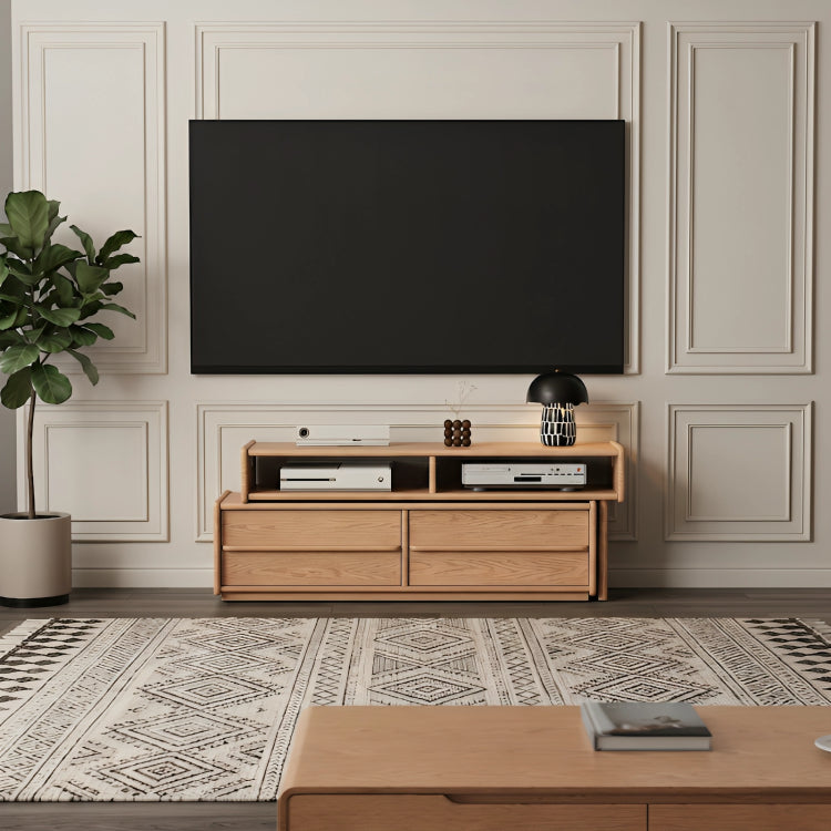 Wooden TV stand with a television mounted on a wall in a living room setting.