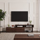 Modern living room with a television mounted on the wall above a wooden entertainment console.