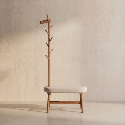 Walnut giraffe-style coat rack and cushioned shoe bench in an entryway