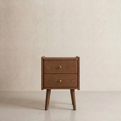 Natural wood two-drawer nightstand between lounge chairs