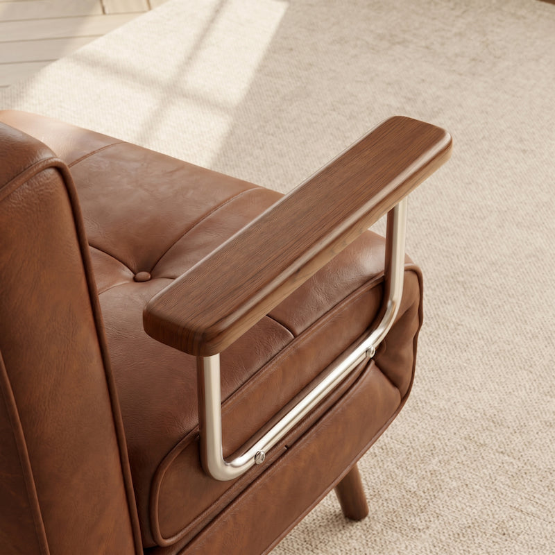 Brown leather armchair with wooden armrests on a beige carpet